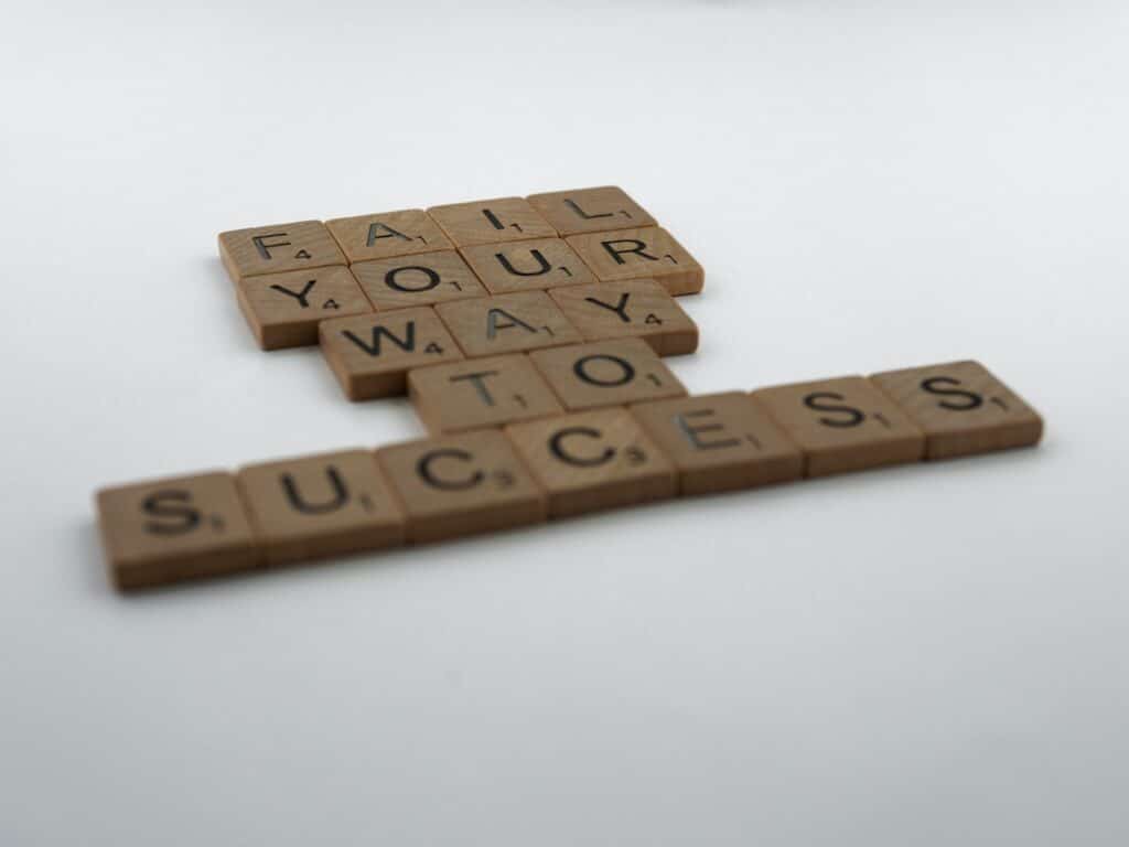 Scrabble letters spell out the phrase: Fail your way to success. In-store tests that have neutral or negative results empower retailers to fail fast and move forward in more successful directions. 