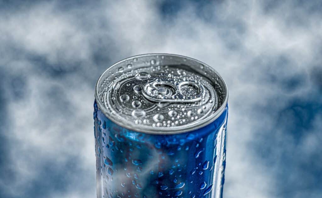 A blue soda can with water droplets against a misty background. Private label brands are "generic" versions of name brands but often offer equal or greater value.